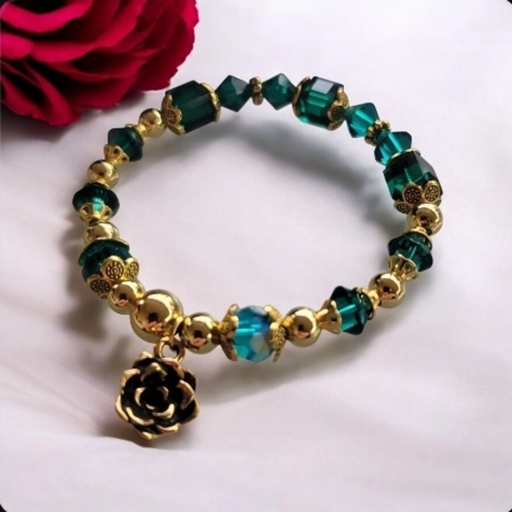 Elegant Gold and Green Bracelet with Rose Charm